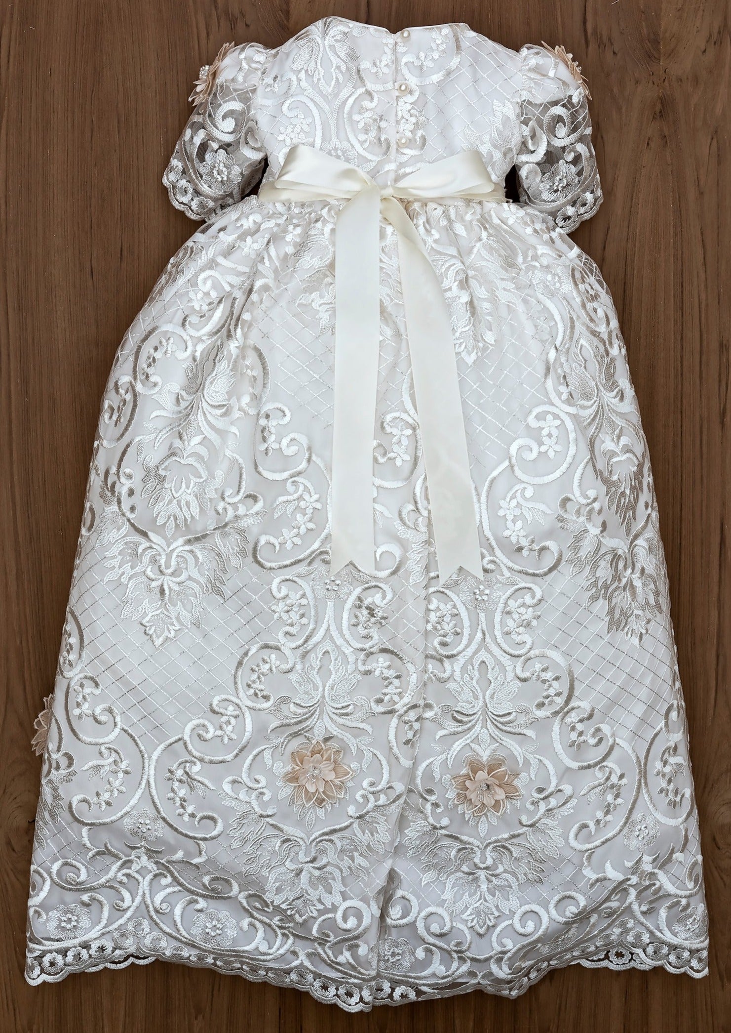 handcrafted, features a beautiful lace all along the dress. Elegant and unique style. Burbvus G025