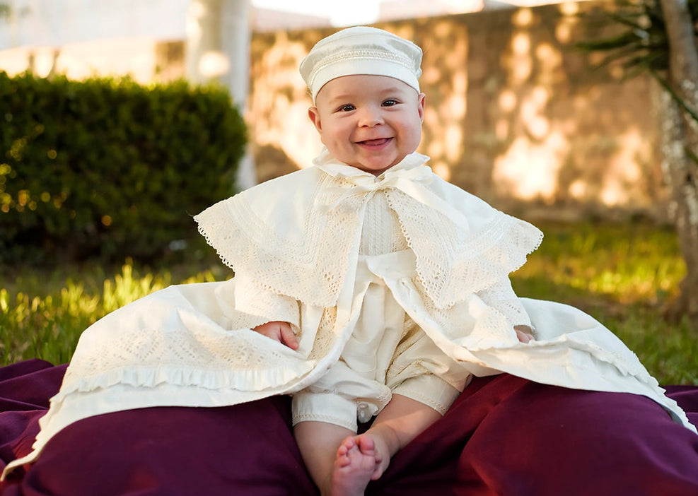 Bernardo wearing Christening Gown B004 in Ivory Color with Detachable cape and skirt